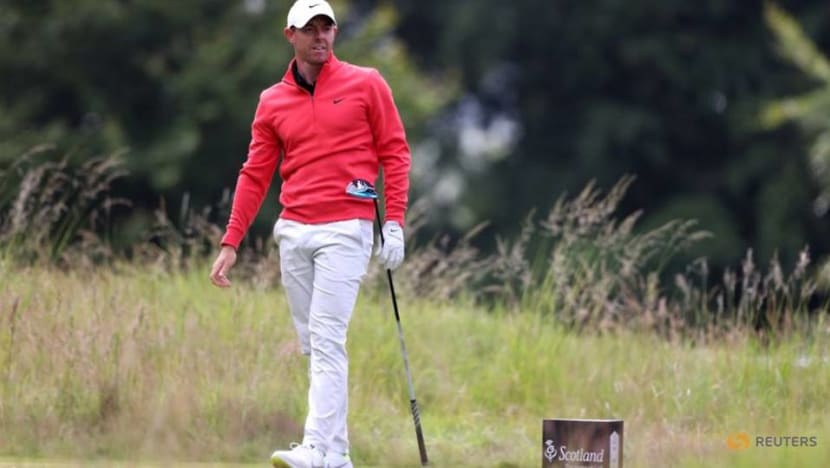 Golf-Out of bounds: Spectator takes swing with McIlroy's club in Scottish Open drama Golf-Out of bounds: Spectator takes swing with McIlroy's club in Scottish Open drama