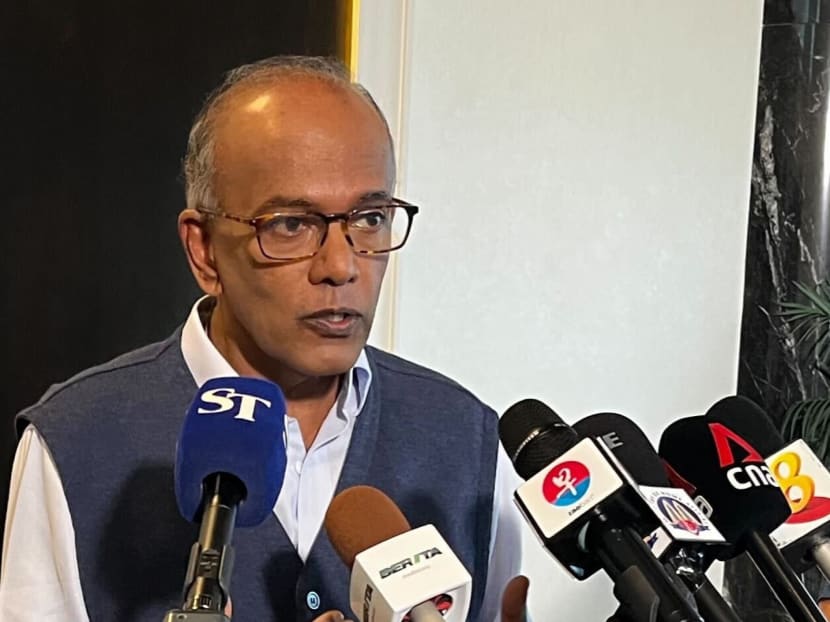 Law and Home Affairs Minister K Shanmugam speaking to reporters on Monday (May 23).