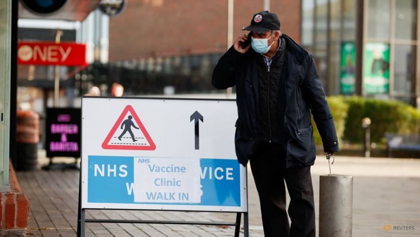 Britain reports record COVID-19 prevalence as Omicron surges