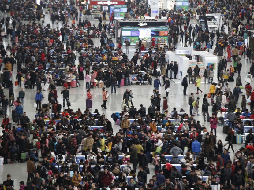 People wait for their trains at Hongqiao train station in Shanghai, ahead of Chinese New Year on Feb 9, 2015. Chinese Ministry of Transport said a total of 2.807 billion trips are expected to be made during the 40-day Spring Festival travel rush, which will begin on Feb 4 and last until March 16, Xinhua News Agency reported. Photo: Reuters