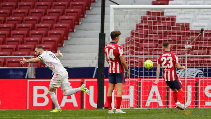 Football: Benzema pounces late on to deny Atletico derby win Football: Benzema pounces late on to deny Atletico derby win