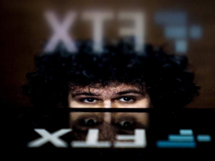 Photo illustration taken on Nov 13, 2022, shows the logo of cryptocurrency FTX, reflected in an image of former chief executive Samuel Bankman-Fried, in Washington, DC. Photo illustration taken on Nov 13, 2022, shows the logo of cryptocurrency FTX, reflected in an image of former chief executive Samuel Bankman-Fried, in Washington, DC.