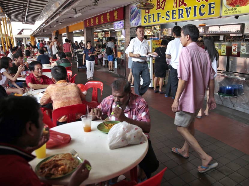 Diners tuck in at a coffee shop or "kopitiam". TODAY file photo