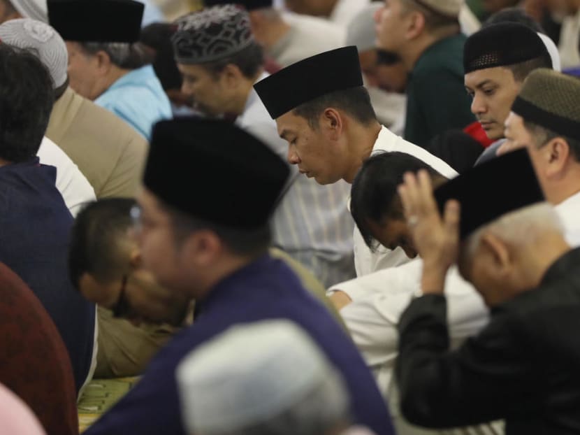 Muslims attending the Eidulfitri prayer at the Sultan Mosque in 2018. Since the start of Ramadan on May 6, supermarket chains such as NTUC FairPrice and Giant have been distributing complimentary food items near buka puasa, or when Muslims end their daily fast at sunset.