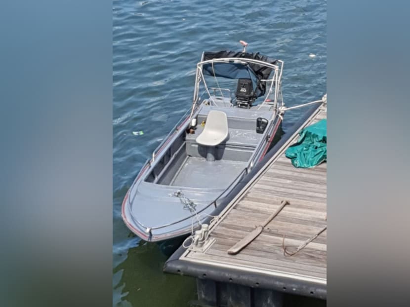 The fibreglass boat the men allegedly used to try to enter Singapore illegally on Aug 27, 2021.