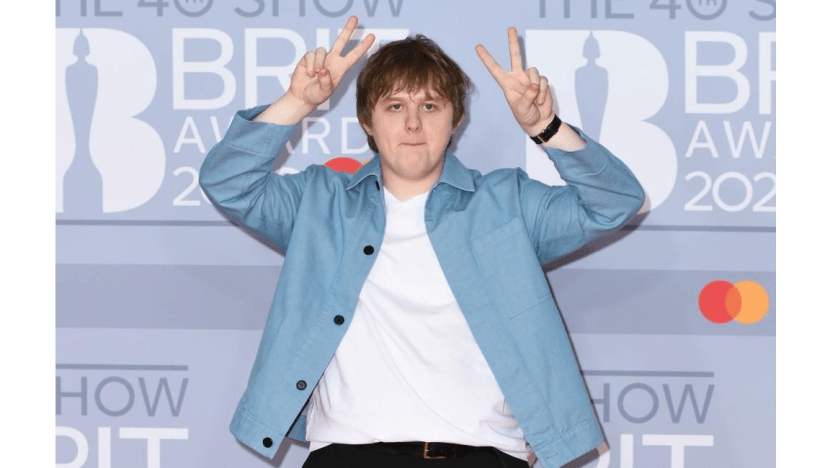 Lewis Capaldi downs drink as he wins first BRIT