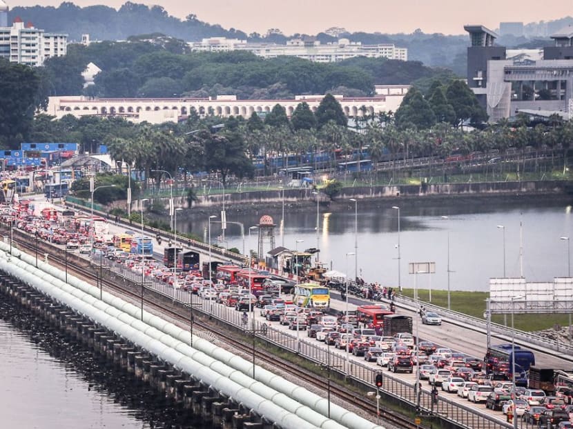 It is estimated that more than 300,000 Malaysians cross both the land checkpoints from Malaysia to Singapore.