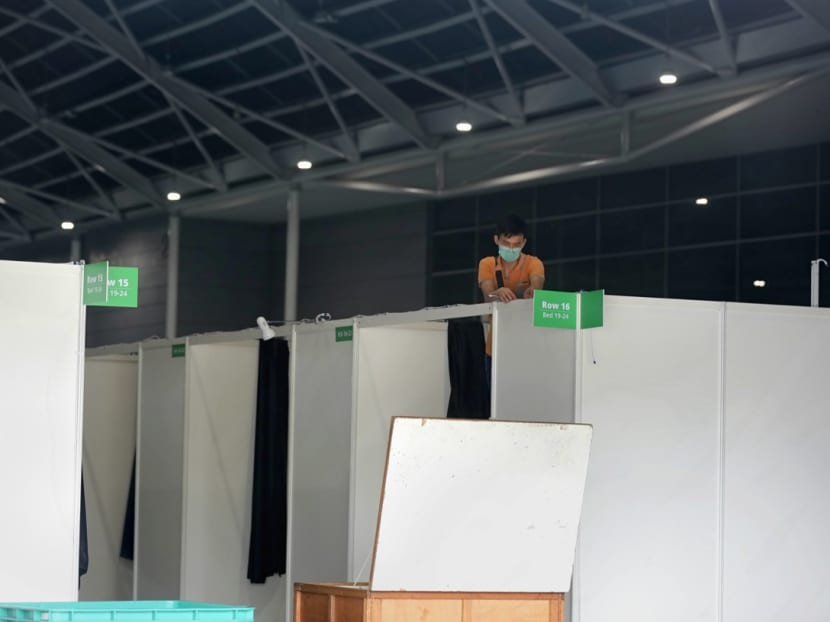 Contractors at the Singapore Expo preparing the halls to be used as a community care facility on April 9, 2020.