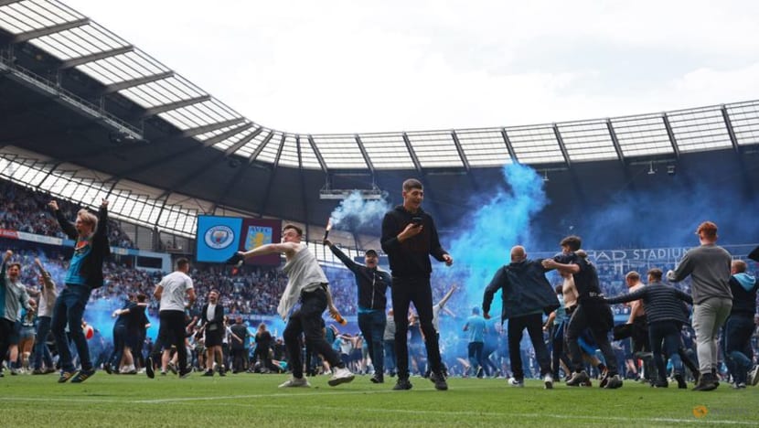 Man City fined for pitch invasion after win over Villa Man City fined for pitch invasion after win over Villa