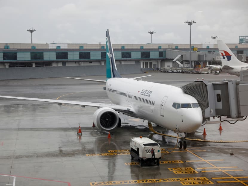 A SilkAir Boeing 737 MAX 8 aircraft sits on the tarmac at Changi Airport in Singapore.
