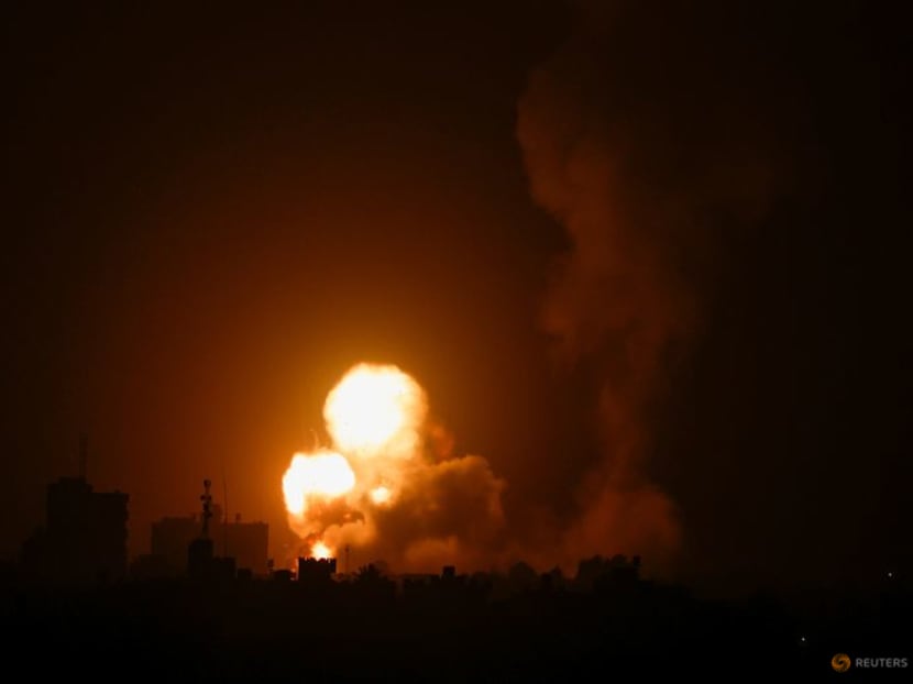 Flames and smoke rise during Israeli air strikes amid a flare-up of Israel-Palestinian violence, in the southern Gaza Strip, April 19, 2022 . REUTERS/Ibraheem Abu Mustafa