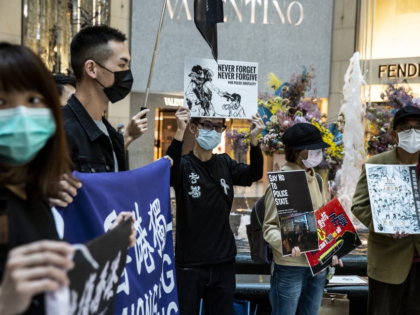 Office workers and protesters gather during a pro-democracy demonstration in a mall in the central district of Hong Kong on Feb 21, 2020. Office workers and protesters gather during a pro-democracy demonstration in a mall in the central district of Hong Kong on Feb 21, 2020.