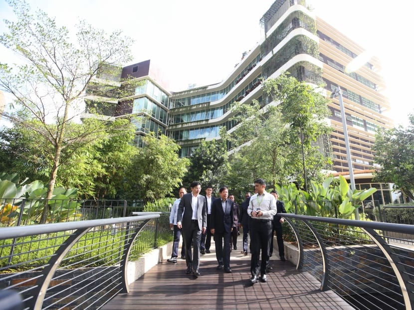 Khaw Boon Wan, Singapore's Coordinating Minister for Infrastructure and Transport (center) and Minister Lawrence Wong (left) accompanied by YB Datuk Seri Abdul Rahman Dahlan, Malaysia's Minister in the Prime Minister's Department and Menteri Besar of Johor, YAB Dato' Mohamed Khaled Nordin during the site visit after 13th Joint Ministerial Committee for Iskandar Malaysia Ministerial Meeting (JMCIM) on 31 July 2017. PHOTO: KOH MUI FONG/ TODAY