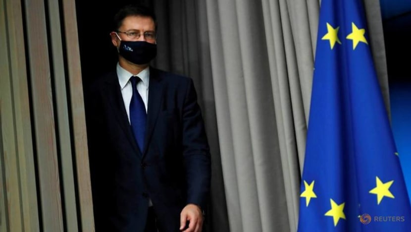 EU 'regrettably' hits US with tariffs, seeks better Biden ties EU 'regrettably' hits US with tariffs, seeks better Biden ties