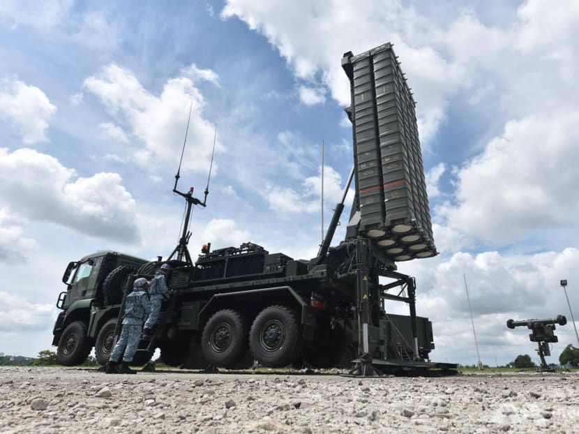Republic of Singapore Air Force operators prepare the Aster 30, a remotely controlled anti-aircraft missile launcher with a range of 70km. It is seen beside an RBS 70 system, a portable air defence missile system with a range of up to 8km.