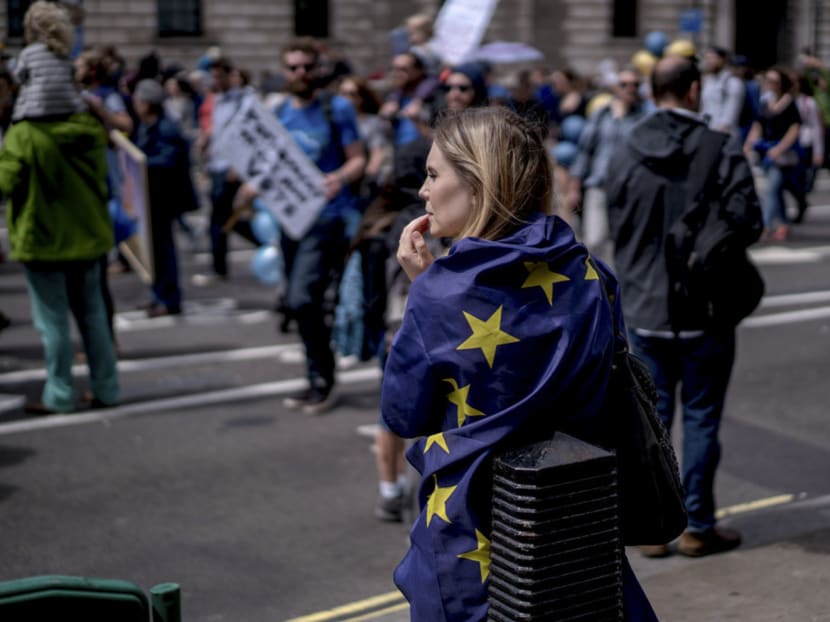 Demonstrators protesting against Brexit in London earlier this month. As the initial shock surrounding 

Britain’s exit wears off, attention has turned to the central banks. While their actions may differ, the 

mood among central banks — which held meetings after the vote — is not aggressive. Photo: The New York Times