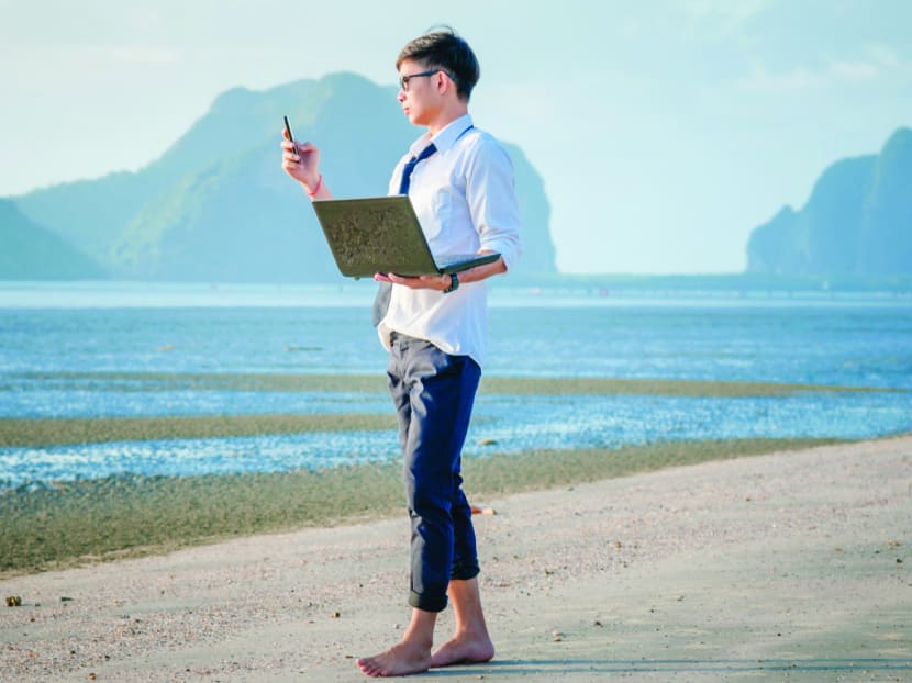 Nine out of 10 Singaporeans are unable to fully relax and switch off from work while vacationing. 
Photo: istock