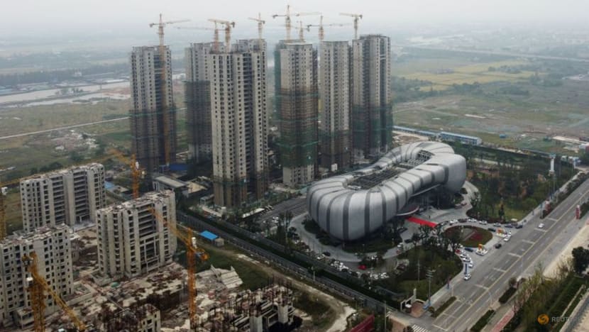 China's debt-ridden Evergrande resumes work on more than 10 property projects China's debt-ridden Evergrande resumes work on more than 10 property projects