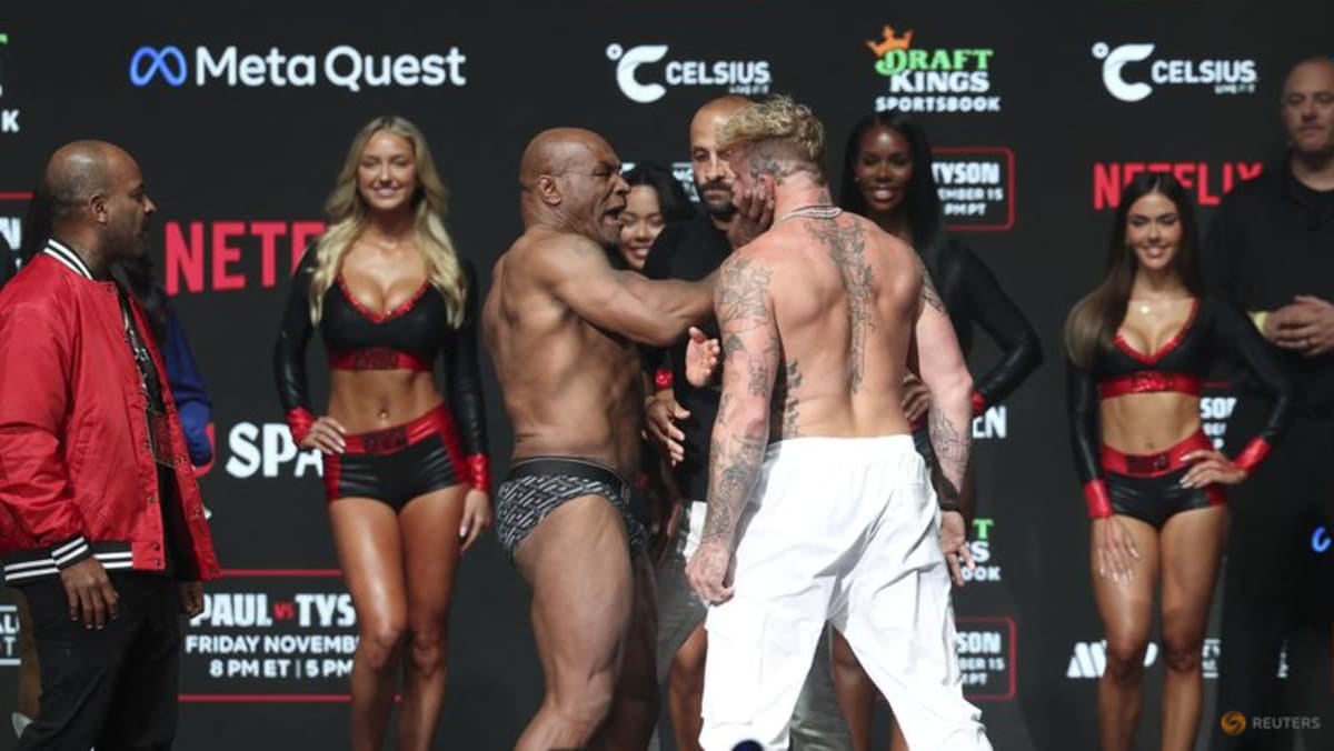 Mike Tyson slaps Jake Paul in final face-off before Netflix bout - CNA