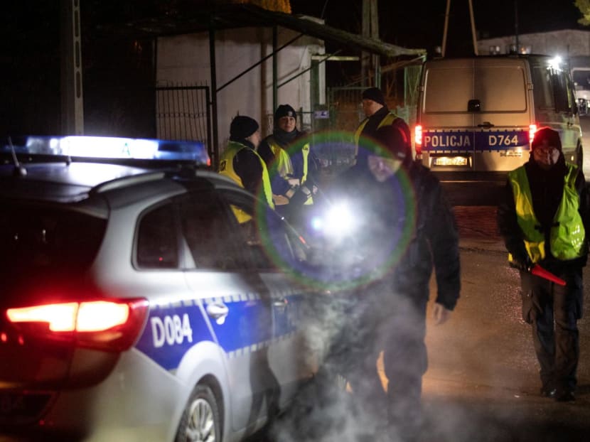 Police block a road, amid reports of two explosions, in Przewodow, Poland, Nov 15, 2022. Police block a road, amid reports of two explosions, in Przewodow, Poland, Nov 15, 2022.