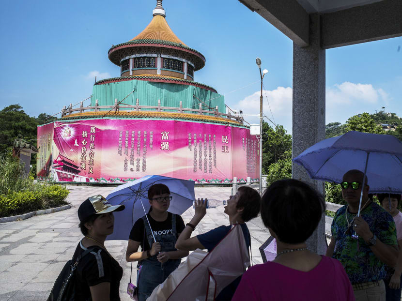 Visitors at a museum about China’s Cultural Revolution in Shantou, China. The museum, about the political campaign begun by Mao Zedong, became a reality through donations. The memorial was recently  covered up. Photo: The New York Times