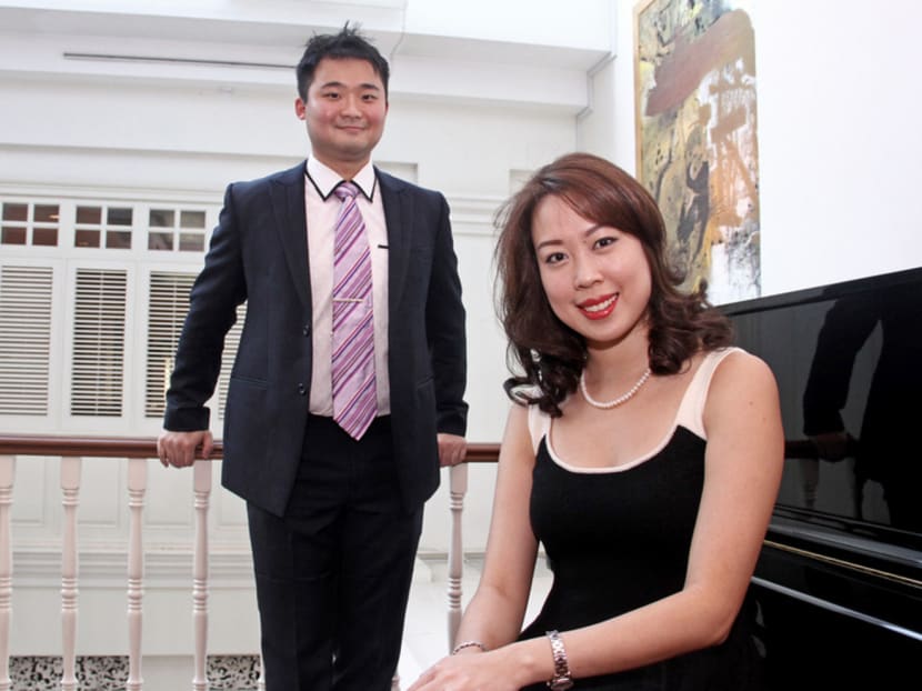 Ms Olivia Tan Xian-li (left) and Mr Nicodemus Oey. Photo: Tristan Loh