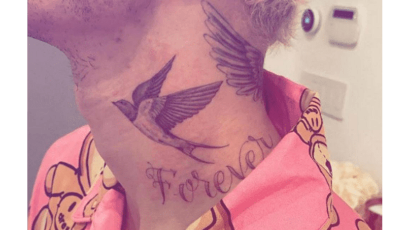 Justin Bieber gets 'forever' inked on neck
