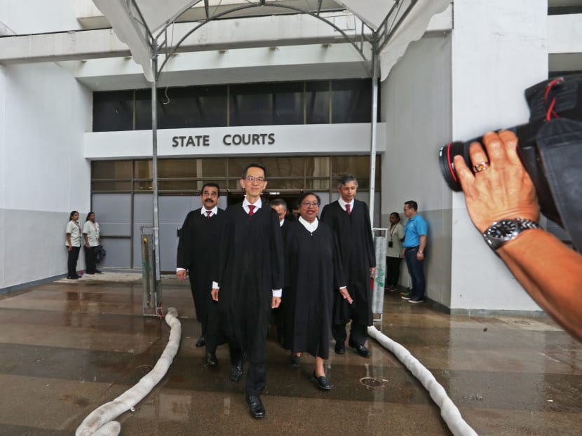 Justice See Kee Oon (centre), Presiding Judge of the State Courts, and Ms Jennifer Marie (right of Justice See), Deputy Presiding Judge of the State Courts, leading a procession out of the old State Courts building to the adjacent State Courts Towers, after a ceremony to mark the closing of the courthouse after 44 years. Justice See Kee Oon (centre), Presiding Judge of the State Courts, and Ms Jennifer Marie (right of Justice See), Deputy Presiding Judge of the State Courts, leading a procession out of the old State Courts building to the adjacent State Courts Towers, after a ceremony to mark the closing of the courthouse after 44 years.