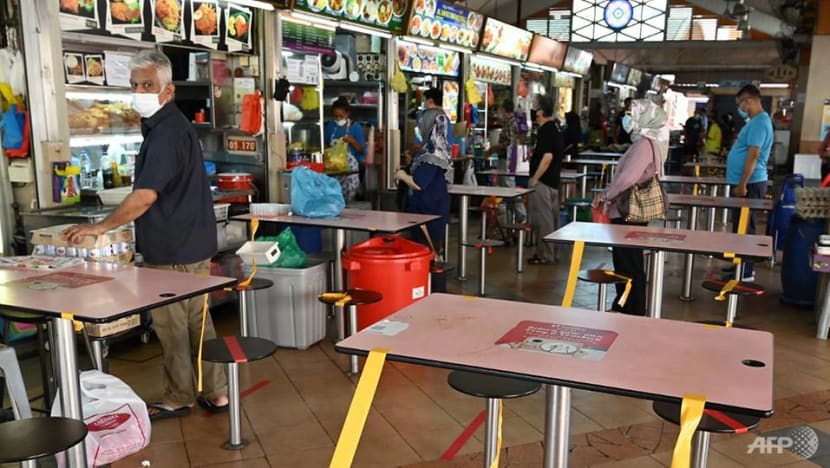 Hawker centres to feature new seating arrangement during Phase 2, hand sanitiser dispensers to be installed: NEA