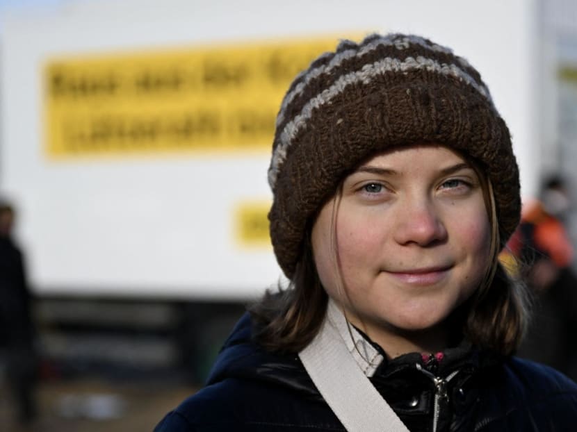 Swedish climate activist Greta Thunberg joins environmentalists gathering in Keyenberg, western Germany, as demonstrations continue against a coal mine extension in the nearby village of Luetzerath, on Jan 17, 2023. 