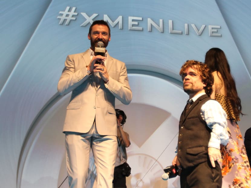 Hugh Jackman and Peter Dinklage onstage in Singapore on Wednesday night. Photo: Alvin Chong.