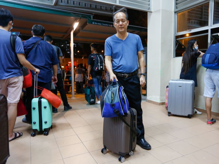 Bus driver Wee Han Chng said he crossed the Johor Baru checkpoint just two minutes before Malaysia's nationwide lockdown kicked in at midnight. Bus driver Wee Han Chng said he crossed the Johor Baru checkpoint just two minutes before Malaysia's nationwide lockdown kicked in at midnight.