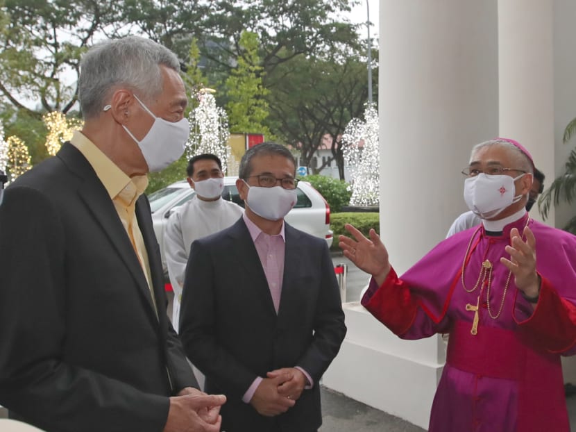 Prime Minister Lee Hsien Loong (left) pictured with Archbishop Goh (right) at the Cathedral of the Good Shepherd in December 2021 at an event to mark the bicentennial of the Catholic Church in Singapore.