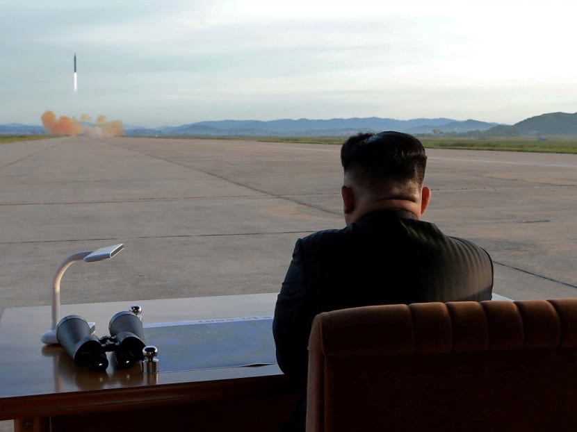 North Korean leader Kim Jong Un watches the launch of a Hwasong-12 missile in this undated photo released by North Korea's Korean Central News Agency (KCNA) on September 16, 2017. Photo: KCNA via Reuters