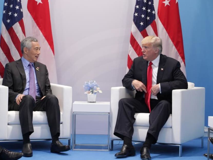 Prime Minister Lee Hsien Loong talks with US President Donald Trump during the G20 leaders summit in Hamburg, Germany. Photo: Ministry of Communications and Information