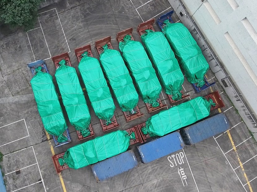 Nine eight-wheeled Singapore-made Terrex infantry carrier vehicles are detained at a container terminal in Hong Kong.  Source: FactWire News Agency