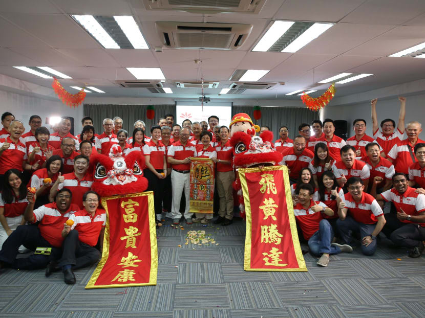 Members of Progress Singapore Party celebrate the opening of their new headquarters in Bukit Timah Shopping Centre on Monday, Jan 27.