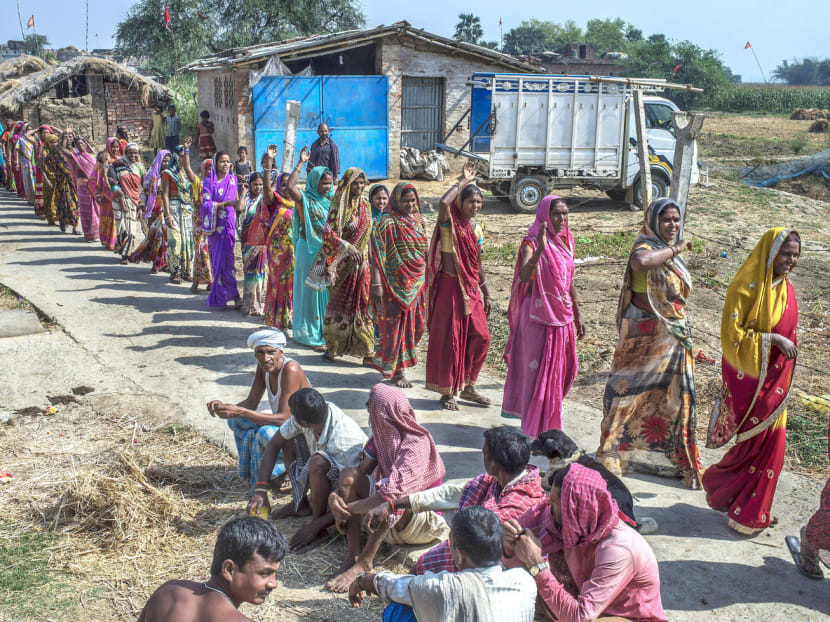 Women in India’s Bihar State marching to the cornfield where they had discovered the illegal moonshine. Since the alcohol ban was imposed in April last year, more than 42,000 people have been arrested and are awaiting trial. Penalties for the sale and consumption of alcohol are severe. Photo: The New York Times