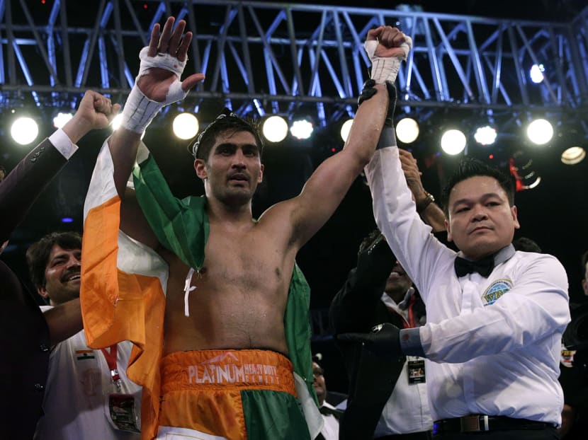 Gallery: Indian boxer beats Chinese rival but doesn’t want his belt