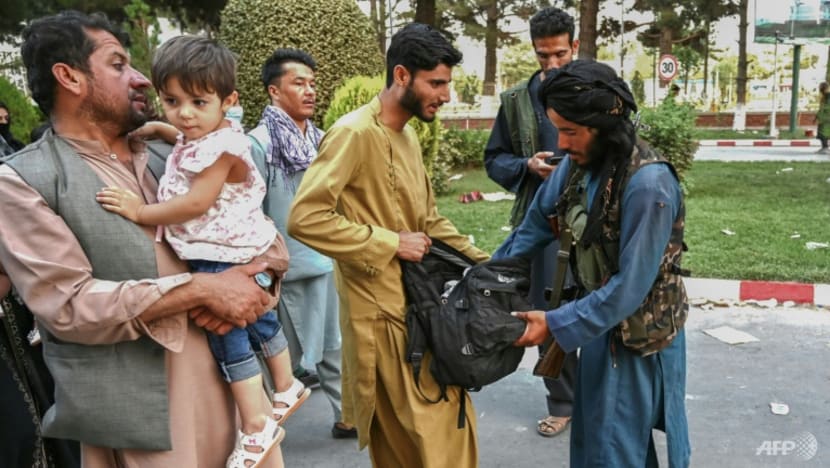 Biden sees 'chaos' as US presses Taliban to let Afghans leave Biden sees 'chaos' as US presses Taliban to let Afghans leave