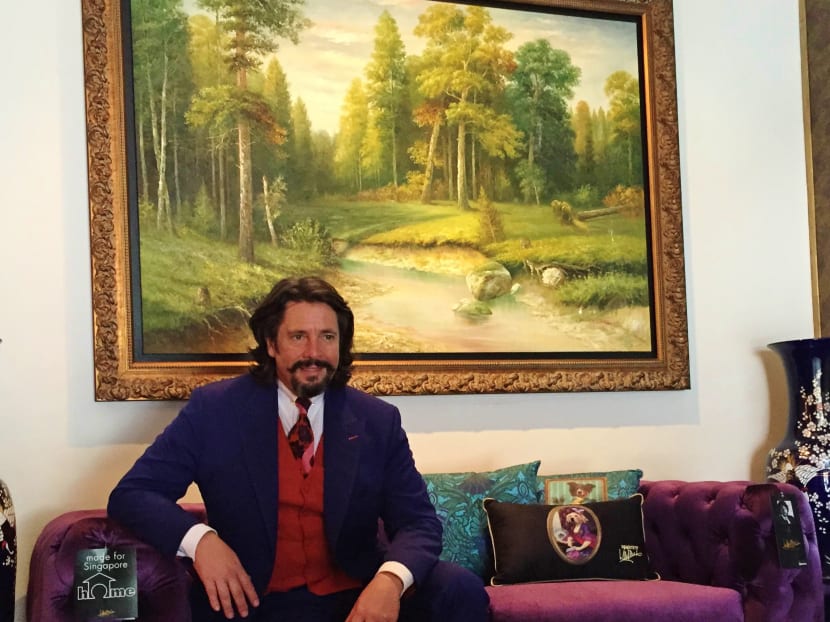 Laurence Llewelyn-Bowen showcase one of his designs for Courts. Photo: Serene Lim.