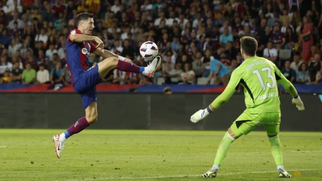 Lewandowski and Cancelo strike as Barca snatch 3-2 win over Celta