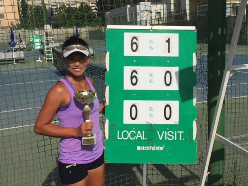 Singapore’s Stefanie Tan with her singles title in the Baku F2 event in Azerbaijan. Tan gave up an attractive job in finance to pursue her dream of competing in a Grand Slam one day. Photo: Team Singapore’s Facebook page