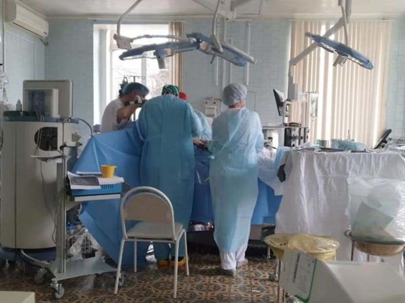 Russian doctors complete open-heart surgery as tsarist-era hospital burns Russian doctors complete open-heart surgery as tsarist-era hospital burns