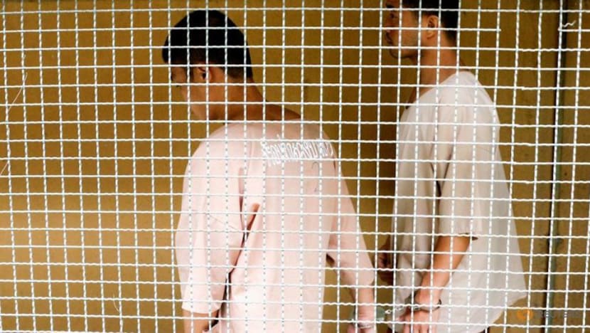 Thai king commutes death sentence for Myanmar men in British tourist murder case Thai king commutes death sentence for Myanmar men in British tourist murder case