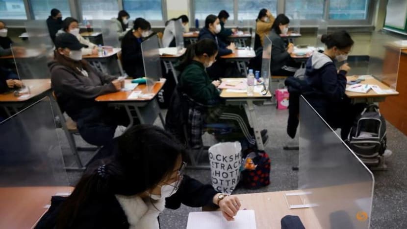 South Korea students sit college exam behind plastic barriers and in hospitals due to COVID-19 South Korea students sit college exam behind plastic barriers and in hospitals due to COVID-19
