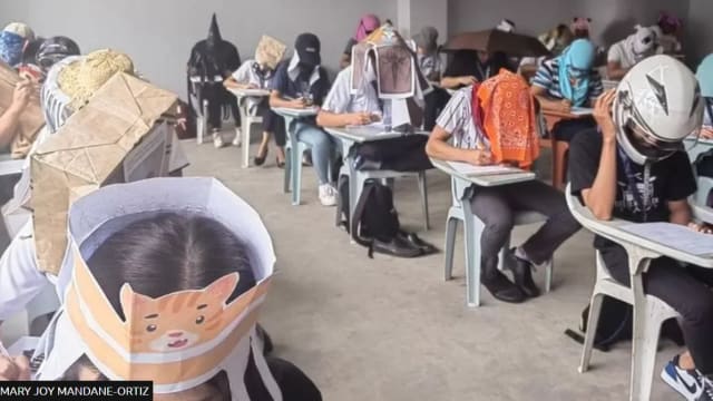 菲律宾大学教授要求自制“防作弊帽” 考生尽显创意引热议