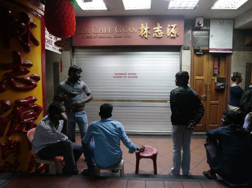 For S$5 an hour, migrant workers queue overnight for bak kwa