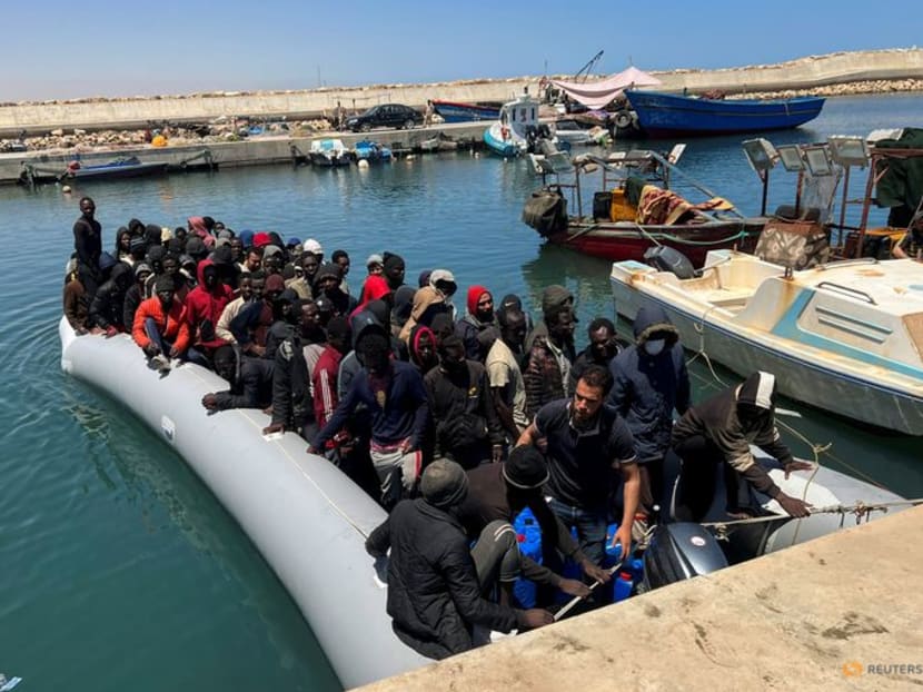 FILE PHOTO:  Migrants rescued by the Libyan Coast Guards in the Mediterranean Sea arrive in Garaboli, Libya, May 23, 2022. REUTERS/Hazem Ahmed