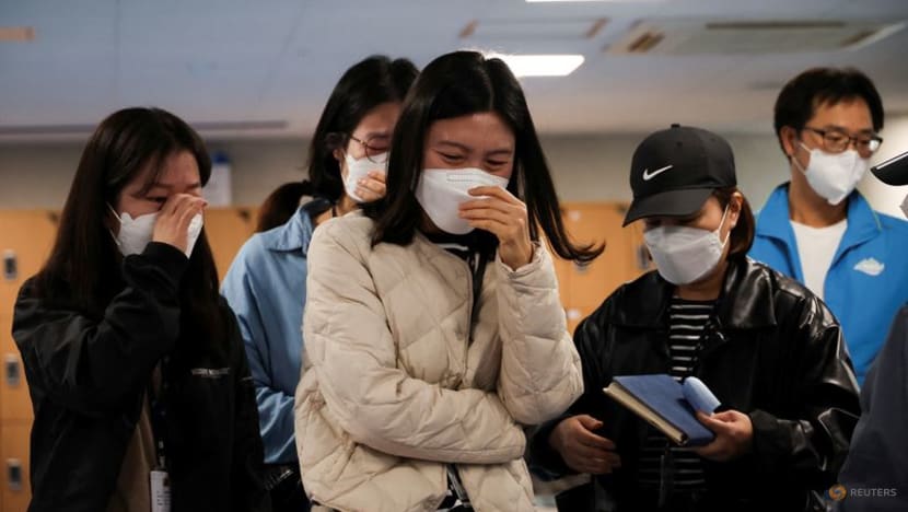 After Halloween stampede in South Korea, families seek missing loved ones, plan funerals